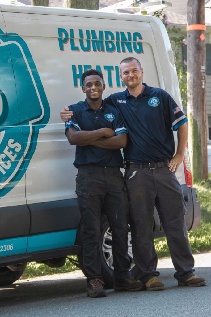 128 technicians standing in front of truck 