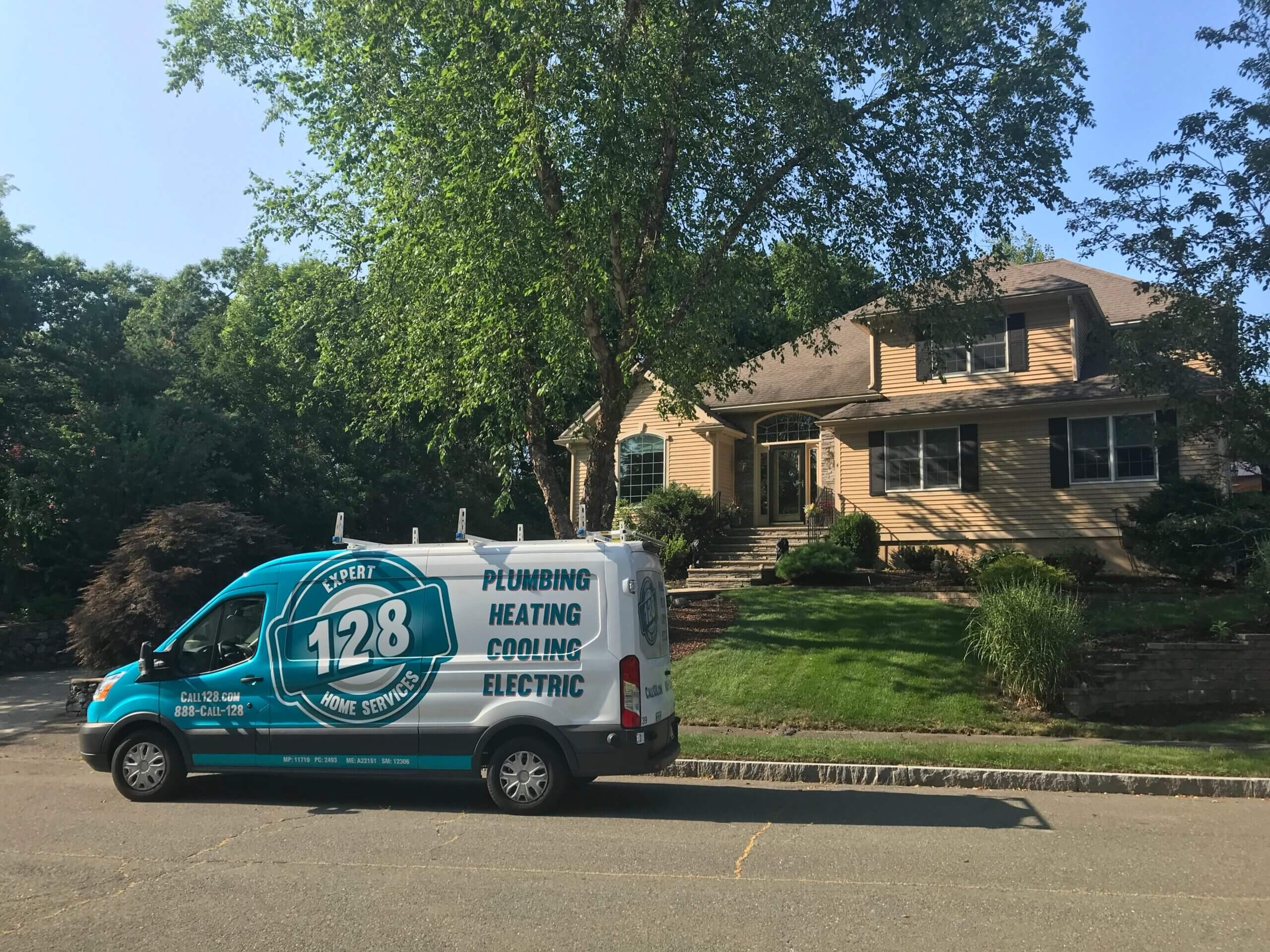 A blue service van from 128 Plumbing known as the expert plumbers in Belmont MA, they are trusted to handle any home service needs efficiently.